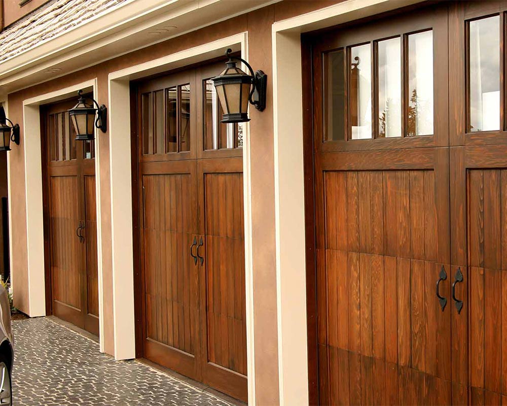 close up on line up of wooden garage doors